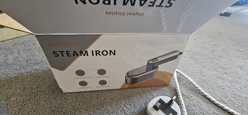 Steam iron new - steam,